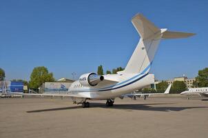 business plane parked at the airport photo