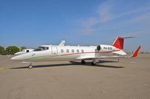 business plane parked at the airport photo