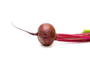 Red fresh beet with a tops of vegetable photo