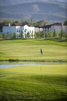 Fine golf club in foothills of Zailiyskiy Alatau photo