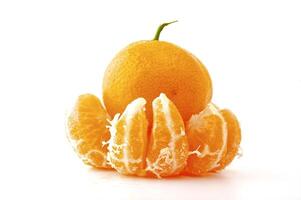 Ripe tangerines on the white background photo