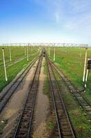 The railway in steppes of Kazakhstan photo