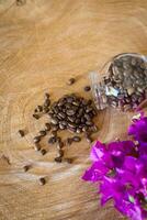 Coffee beans on a wooden table photo