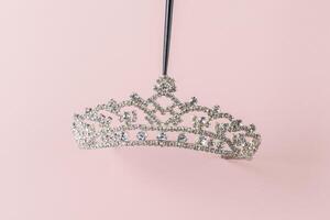 Tiara on a pink background photo