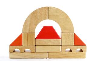 Wooden toy blocks on white background photo