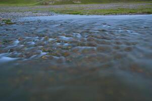 The mountain river in twilight, Almaty area, Assy photo