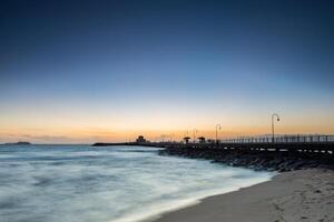 Sunset on St Kilda Pier in Melbourne, Australia. photo