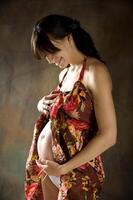 The beautiful young girl, the third trimester of pregnancy photo