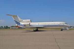 business plane parked at the airport photo