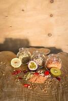 Raw cereals set on wooden background photo