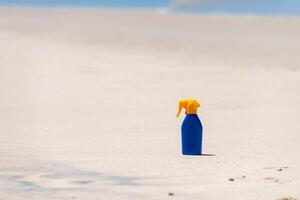 Bottle of sunscreen photo