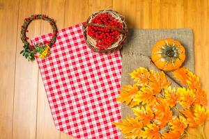 Yellow and red flowers on the table. photo