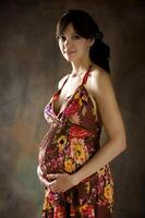 The beautiful young girl, the third trimester of pregnancy photo