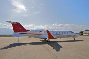 business plane parked at the airport photo