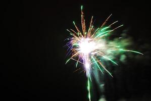 Color Firework in the night sky photo