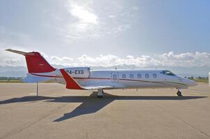 business plane parked at the airport photo