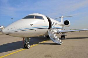 business plane parked at the airport photo