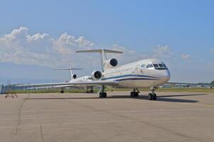 business plane parked at the airport photo