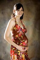 el hermosa joven chica, el tercero trimestre de el embarazo foto