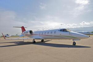 business plane parked at the airport photo