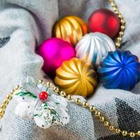 Christmas decorations on a color background. New year toys. photo