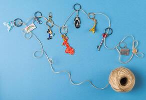 Souvenirs keychains from different cities of the world photo