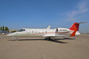 business plane parked at the airport photo