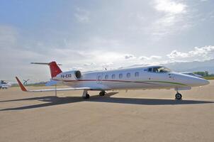 business plane parked at the airport photo