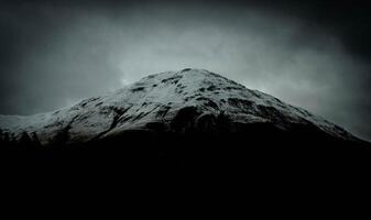 snow-filled mountain tops after a summer snowfall, in Livigno, Valtellina in the summer of 2023 photo