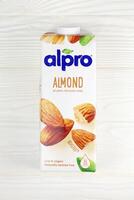 KHARKOV, UKRAINE - JULY 2, 2020 Alpro almond milk packs produced by European company from Wevelgem, Belgium photo