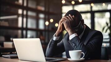 Stressed young African American student of school of economics feeling frustrated while working on diploma project sitting at coworking space in front of open laptop computer holdi, Generative AI photo