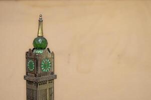 miniature of the world's tallest clock tower or zam-zam tower or Abraj Al-Bait building in Mecca, Saudi Arabia, 10 October 2023. photo