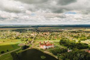 View from the height of the Mir Castle in Belarus and the park on a summer day.Belarus photo