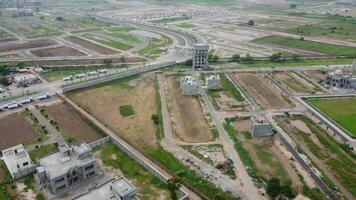 Rectangular shaped settlement of the rich district, looking down aerial view from above Bird eye view villas with pool on 2023-07-22 in Lahore Pakistan video