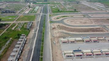 Rectangular shaped settlement of the rich district, looking down aerial view from above Bird eye view villas with pool on 2023-07-22 in Lahore Pakistan video