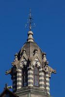 Detail of the historic, Gothic Revival style, Rafael Uribe Uribe Palace of Culture located at the Botero Square in Medellin declared National Monument of Colombia in 1982. photo