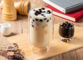 Brown Sugar Pearl Thick Soy Milk served in glass isolated on table top view of asian food photo
