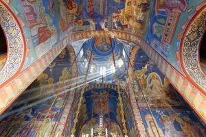 Interior shot of orthodox church. Religion. Christianity. Holy figures. Shiny altar. Interior of the Hercegovacka Gracanica Monastery in Trebinje, Bosnia and Herzegovina. photo