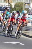 Imperia, IM, Liguria, Italy - March 16, 2024 An important cycling race in a small town in Italy in March. The name of the competition is Milano-Sanremo 2024 photo