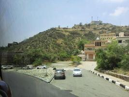 Asir, Saudi Arabia, 12 April 2024 - Beautiful daytime view of Rijal Almaa heritage village in Asir region in Saudi Arabia. photo