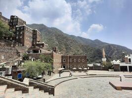 Asir, Saudi Arabia, 12 April 2024 - Beautiful daytime view of Rijal Almaa heritage village in Asir region in Saudi Arabia. photo