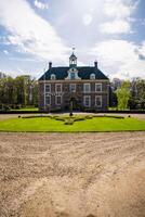 Diepenheim, Netherlands - April 7, 2024. Historic Castle Warmelo in Province Overijssel near city Diepenheim in Netherlands. High quality photo