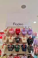 Jakarta, Indonesia on December 21 2023. Fladeo brand sandals on display for sale at a Matahari Department Store. photo