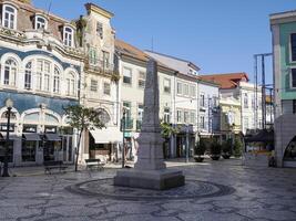 liberty monument column in Old town Main place of Aveiro pictoresque village street view, The Venice Of Portugal photo