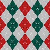 Argyle vector pattern. Argyle pattern. Red and green argyle pattern. Seamless geometric pattern for clothing, wrapping paper, backdrop, background, gift card, sweater, Christmas decoration.