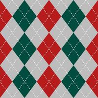 Argyle vector pattern. Argyle pattern. Red and green argyle pattern. Seamless geometric pattern for clothing, wrapping paper, backdrop, background, gift card, sweater, Christmas decoration.