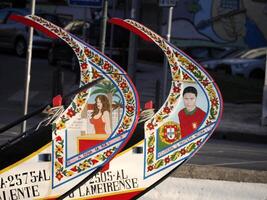 Aveiro Moliceiro boat gondola detail Traditional boats on the canal, Portugal. photo