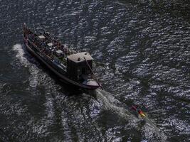 cruise boat tour Porto portugal on the Douro River top view from bridge photo