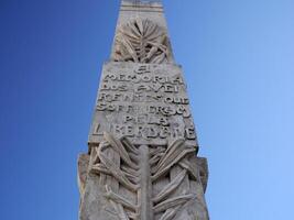 liberty monument column in Old town Main place of Aveiro pictoresque village street view, The Venice Of Portugal photo