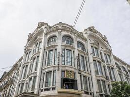 Renaissance building with tower in Avenida dos Aliados Porto old town street view building, portugal photo